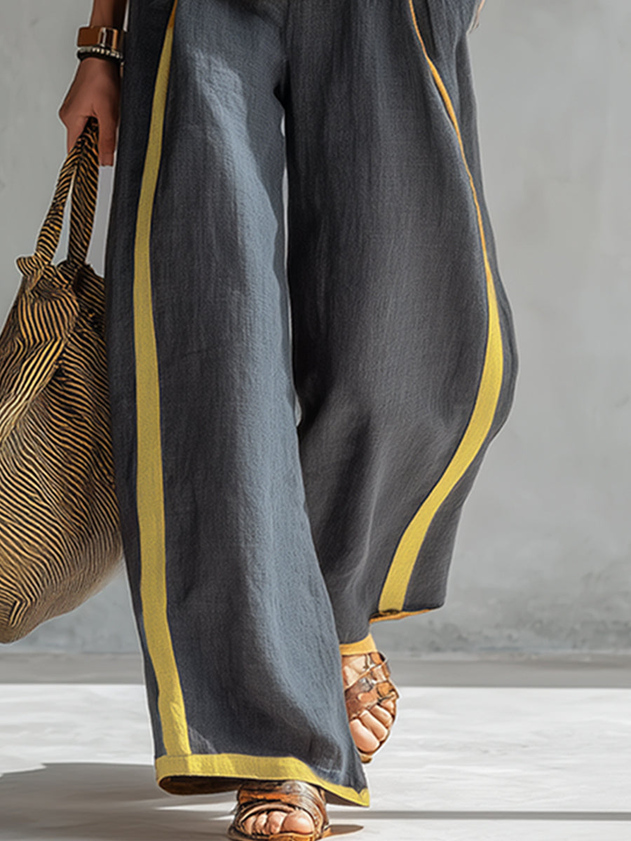 Natalia | Conjunto gris fluido con top sin mangas y pantalón ancho — elegante y cómodo