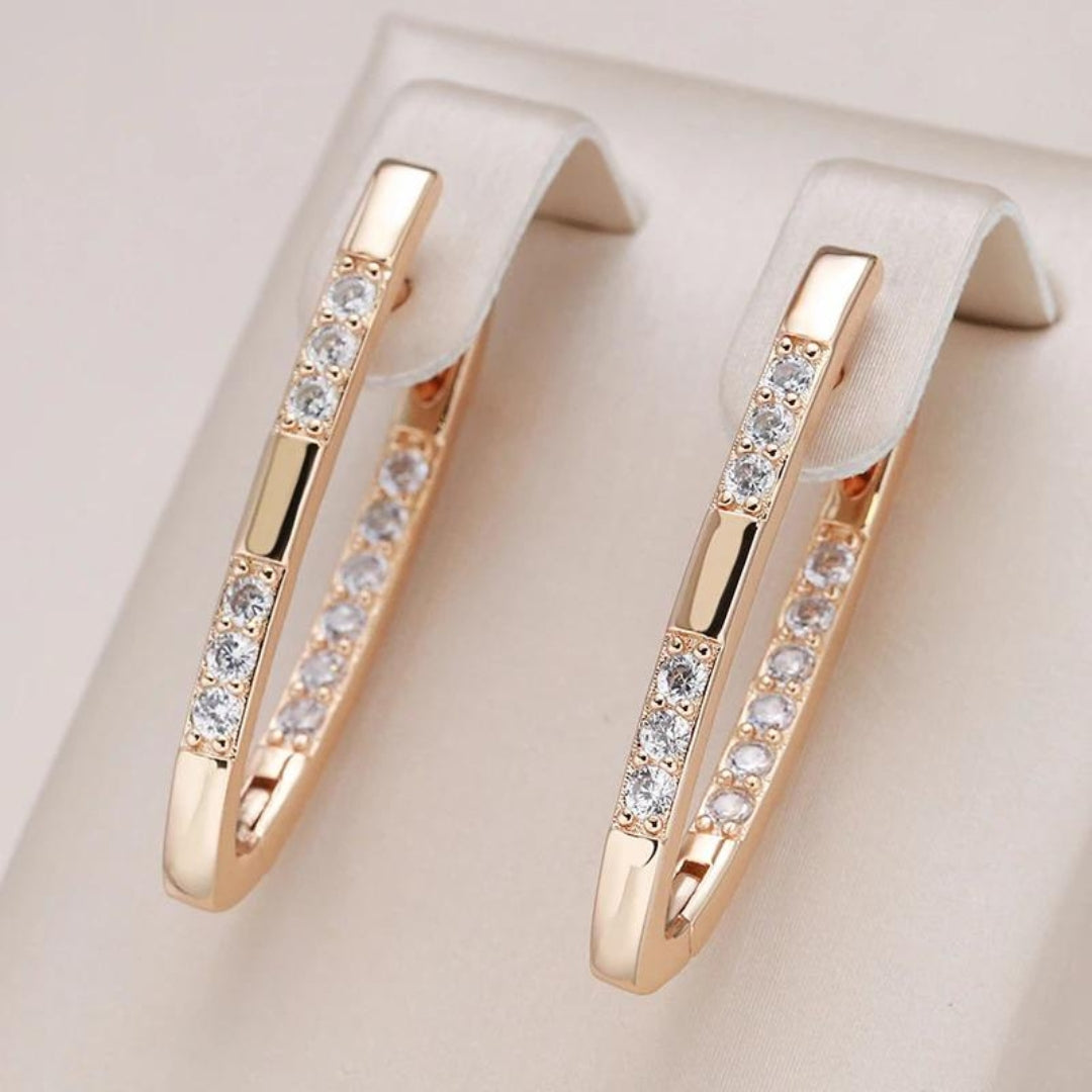 Pendientes de circonita cúbica en oro: elegancia y brillo