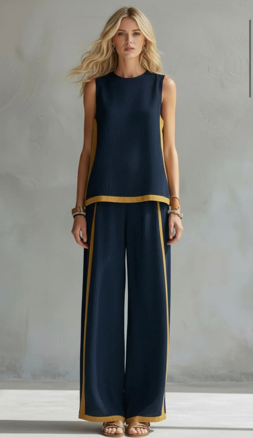 Natalia | Conjunto gris fluido con top sin mangas y pantalón ancho — elegante y cómodo