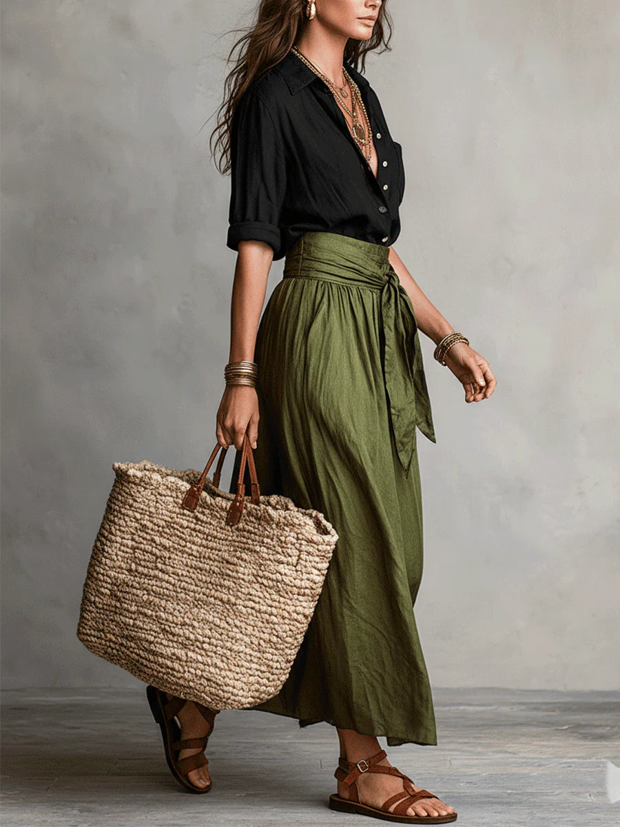 Aitana | Elegante conjunto de dos piezas: blusa negra y falda midi verde oliva para mujer