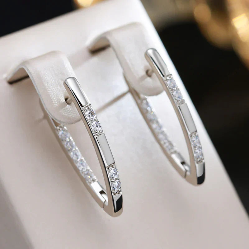 Pendientes de circonita cúbica en oro: elegancia y brillo