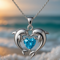 Collar de plata atemporal con dos delfines y un ópalo