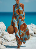 Almaia | Mono fluido con halter y estampado degradado